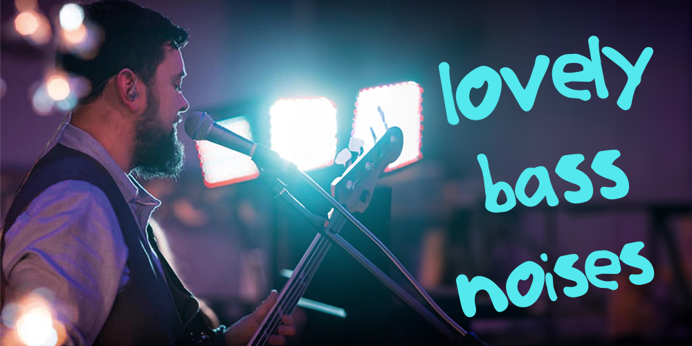 Jamie Ambler playing bass at a gig with the caption 'lovely bass noises'